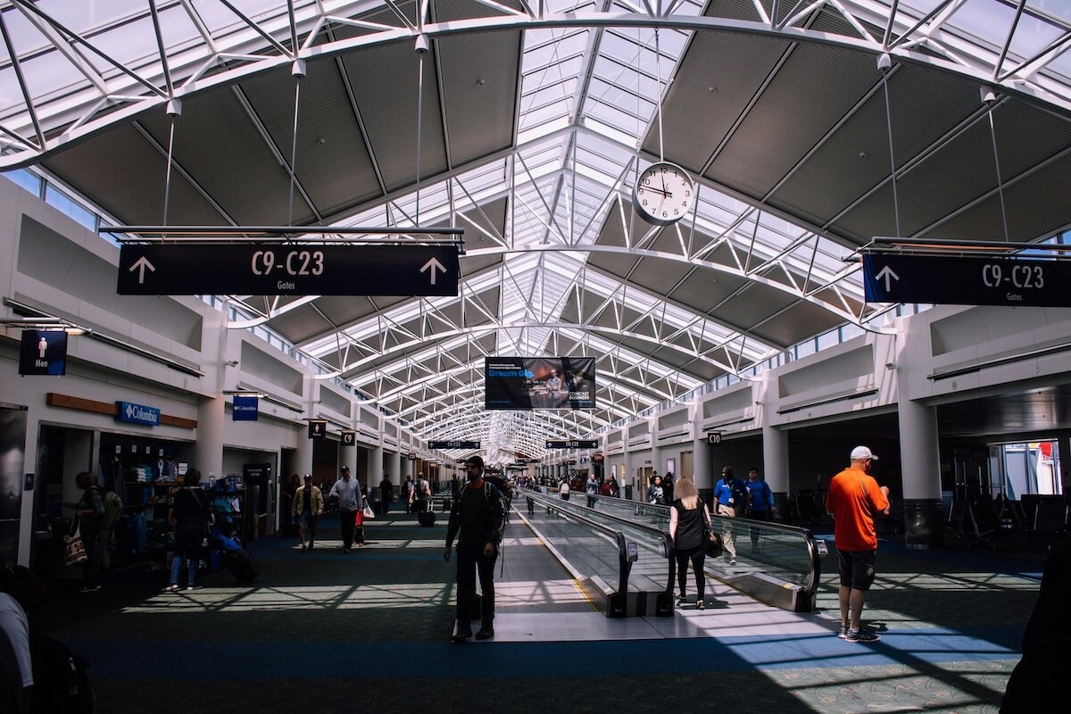 People inside busy airport terminal