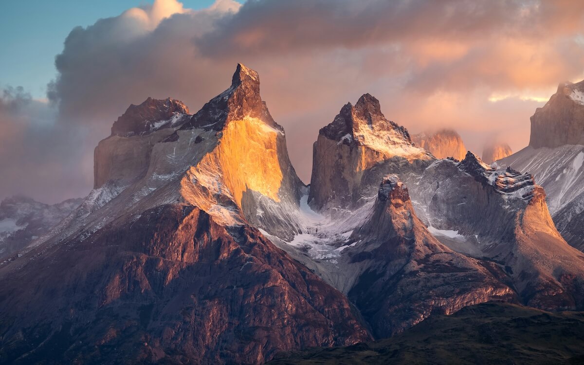 Dramatic sunset over Torres del Paine mountain massif