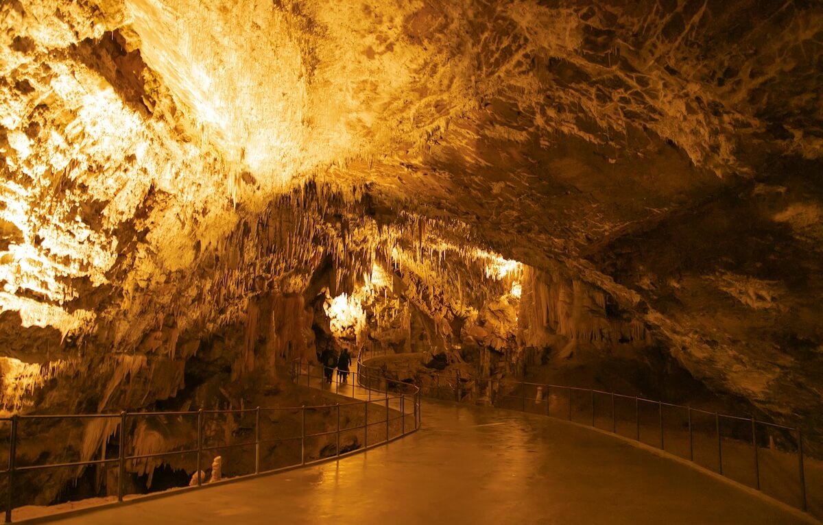 Dramatic stalactites and rock formations inside Postojna Cave, Slovenia