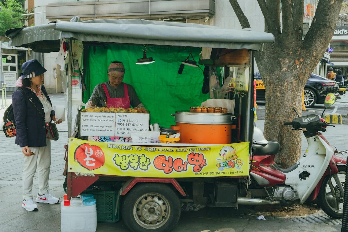 Street food vendor in Seoul selling traditional fish-shaped bread snacks