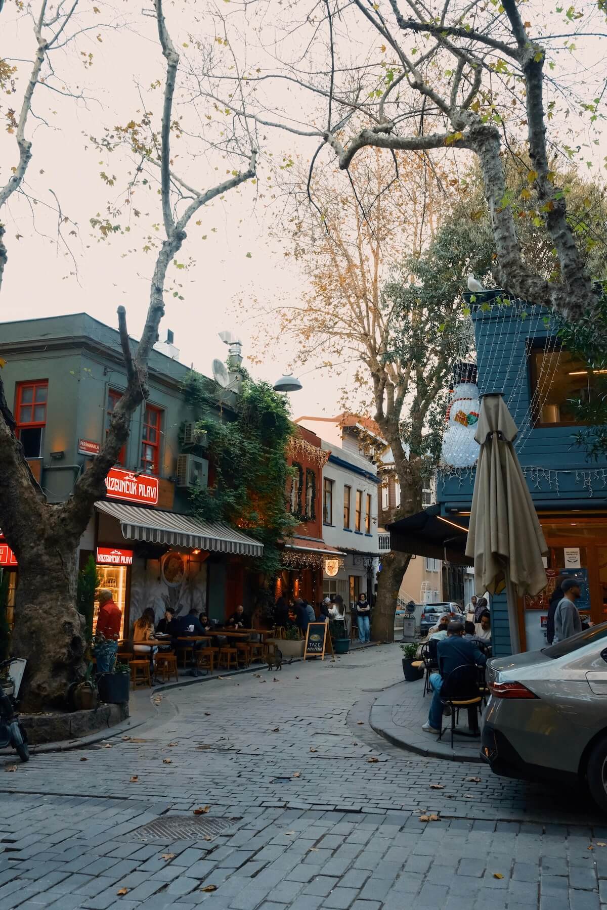 Charming outdoor cafe on a cobblestone street with autumn atmosphere