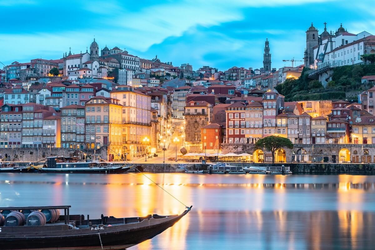 Porto's colorful Ribeira waterfront along the Douro River at sunset
